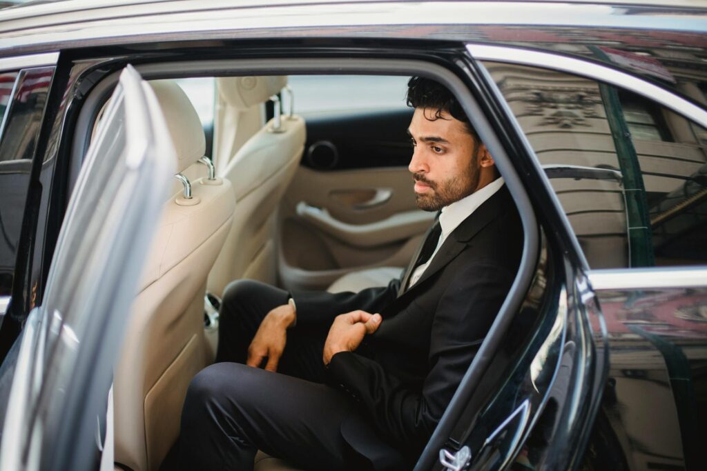 Man in Black Suit Sitting in the Car - Antalya airport transfer